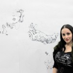Molly Crabapple with the work in progress Molly Crabapple with the work in progress
