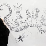 Molly Crabapple works on her massive original Molly Crabapple works on her massive original