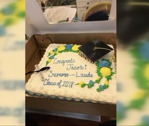 Sheet Cake with “Congrats Jacob! Summa - - - Laude class of 2018” written on it